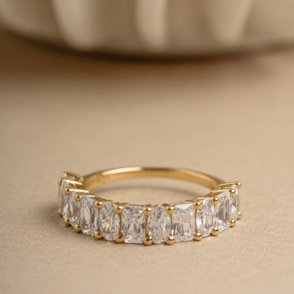 Iris Gold Emerald And Oval Cut Ring